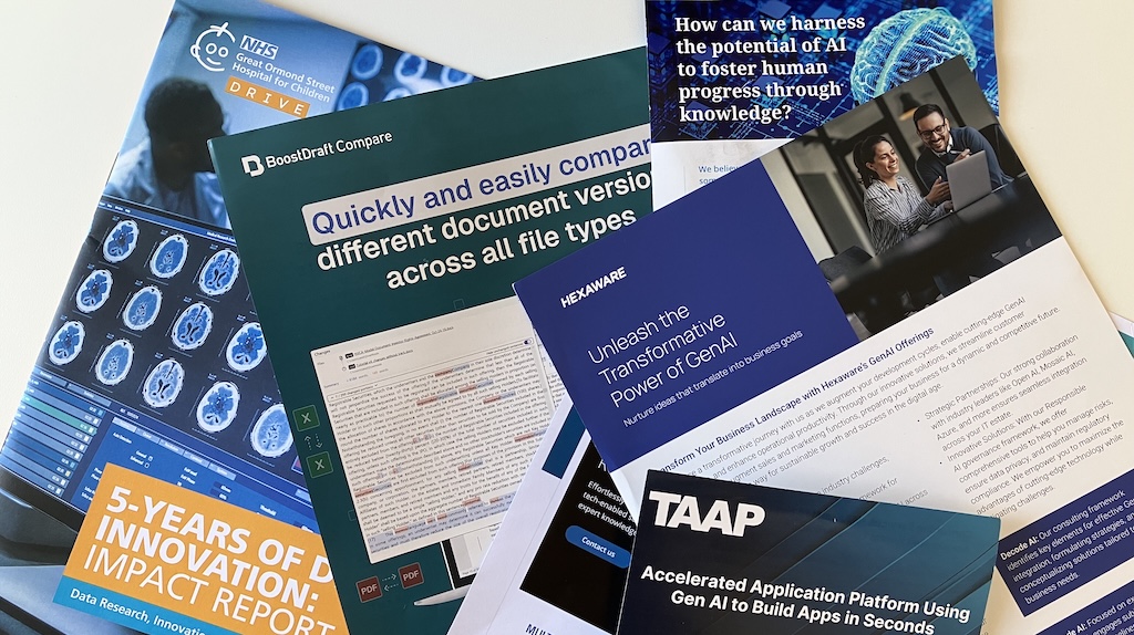 A scattered collection of pamphlets, guides and reports from AI suppliers and buyers, including NHS Great Ormond Street Hospital.