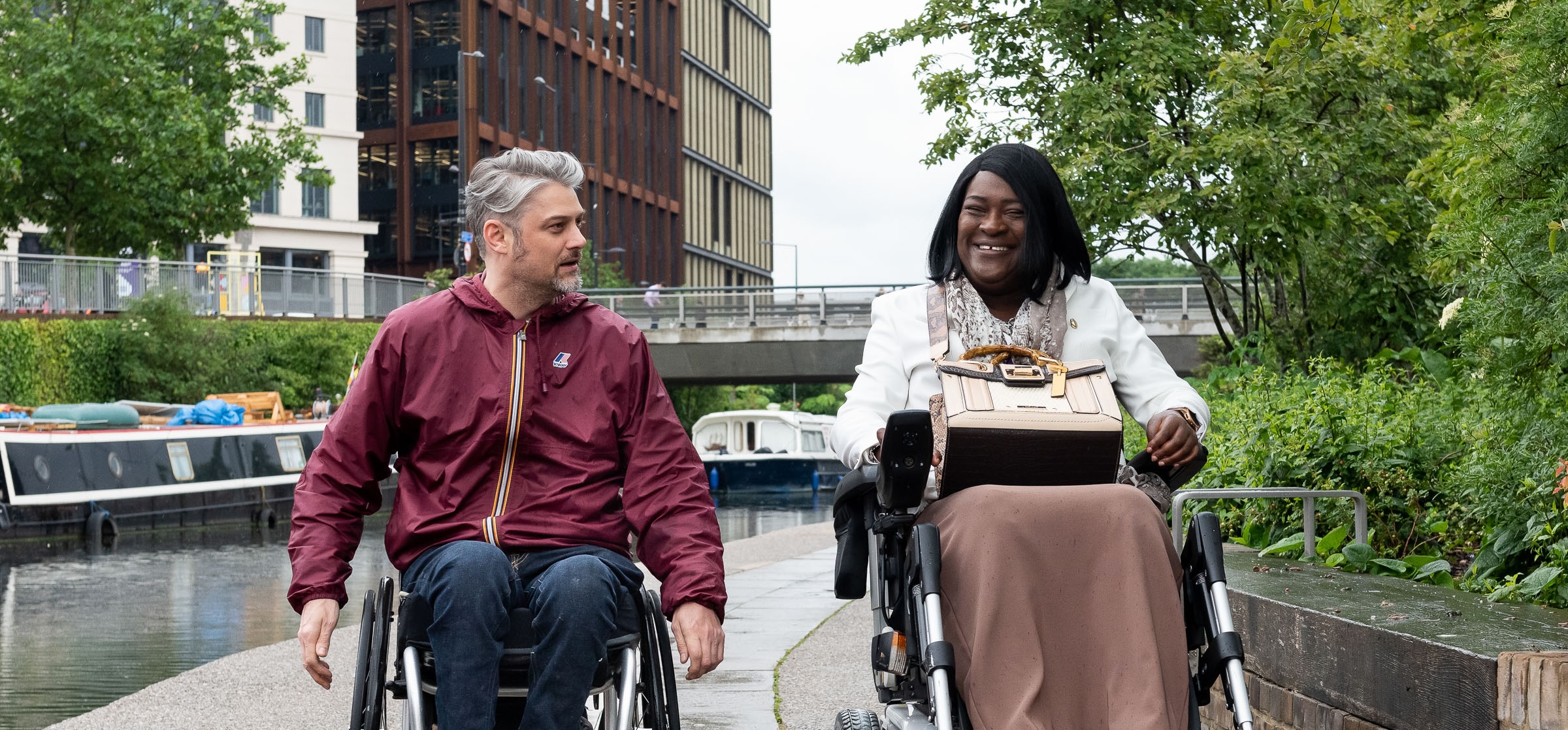 Lady-Marie and a friend in conversation, enjoying a London canal path.