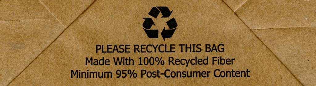 Paper bag with recycling logo and text 'Made with 100% recycled fiber'